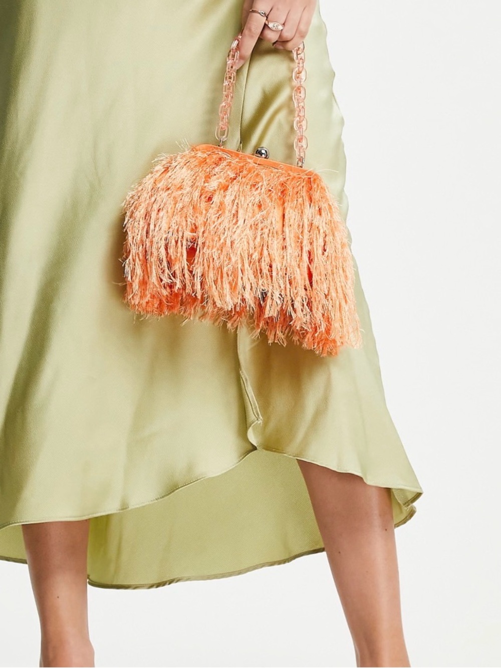ASOS DESIGN faux feather clutch bag with resin handle in orange